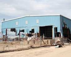 High winds damage a steel building