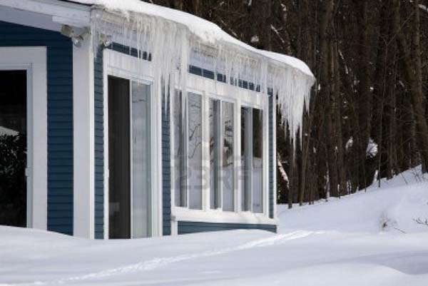 Roof and Gutters Warming up to Ice and Snow