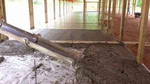 Concrete Slab Larger in Footprint Than Building