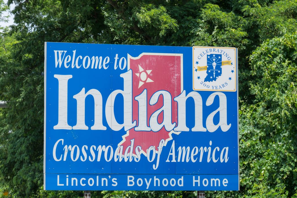 State of Indiana welcome sign on the side of a highway