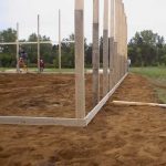 A 100×100 Pole Building, Shingles to Steel, and Double-Bubble